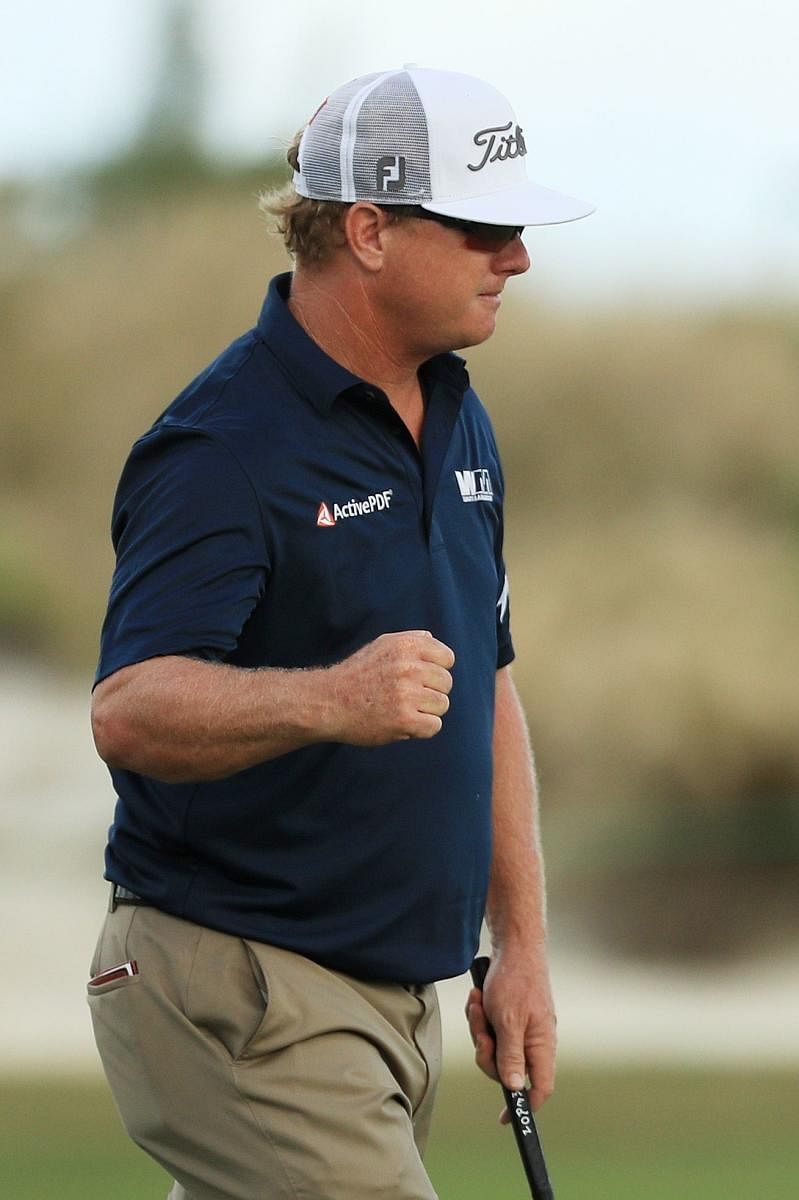 Charley Hoffman of the United States celebrates a birdie during the second round of the Hero World Challenge at Albany, Bahamas on Saturday. AFP