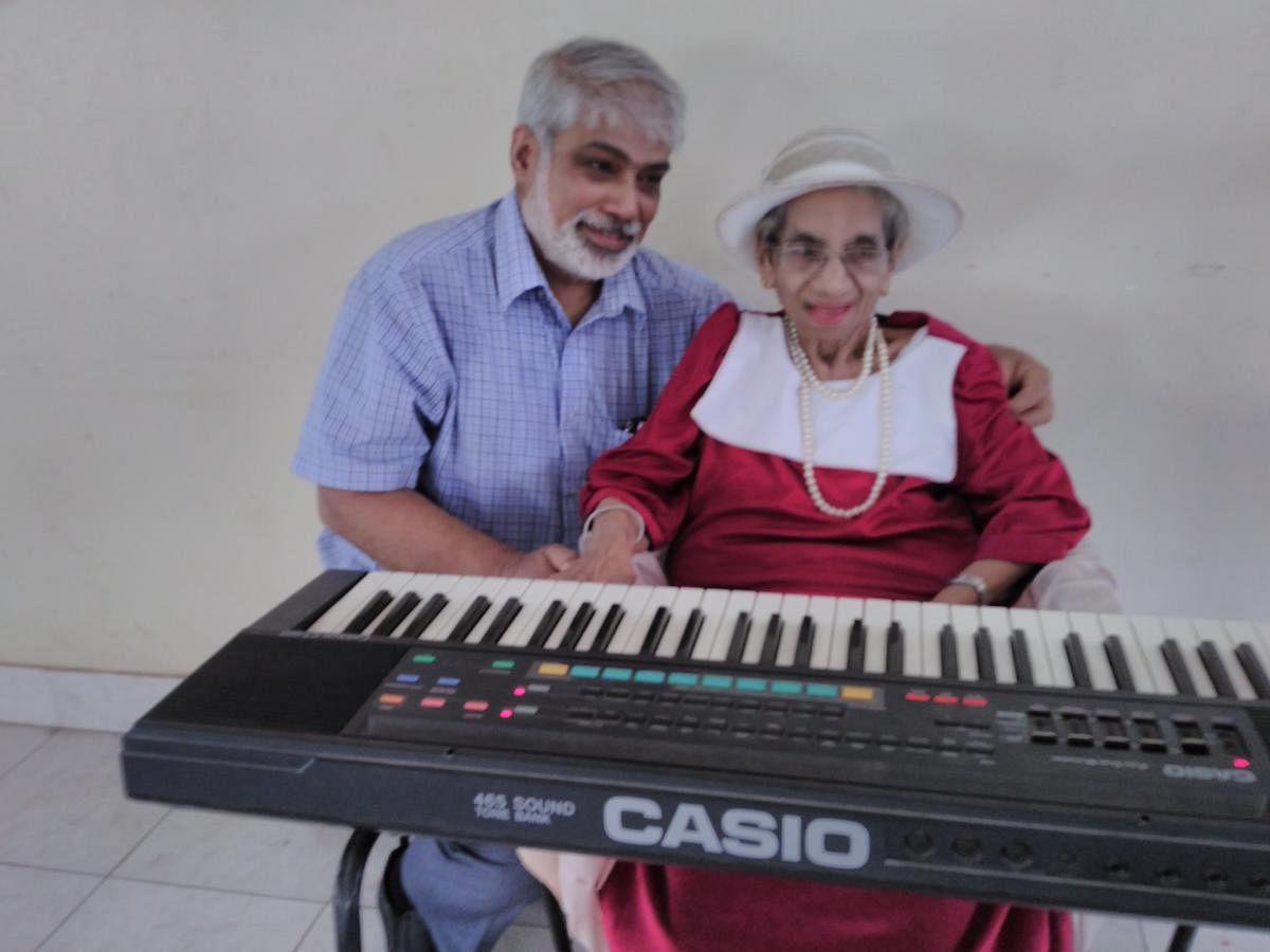 File photograph of 101-year-old Gladys D'Souza with her 68-year-old son Trevor D'Souza, taken on her 100th birthday on March 30, 2017.