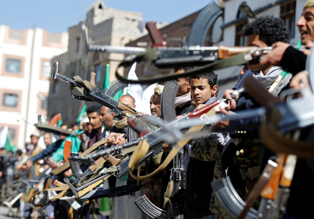 Houthi supporters hold their weapons as they attend a gathering in Sanaa, Yemen. REUTERS FILE PHOTO