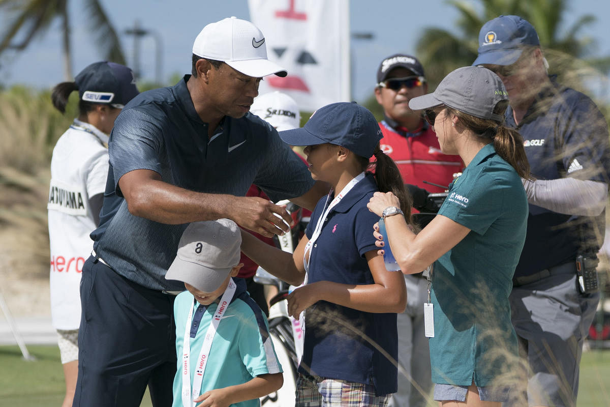 Woods, who is playing for the first time since February, was in trouble from the opening hole, hitting his tee shot at the first into the sand bordering the fairway.