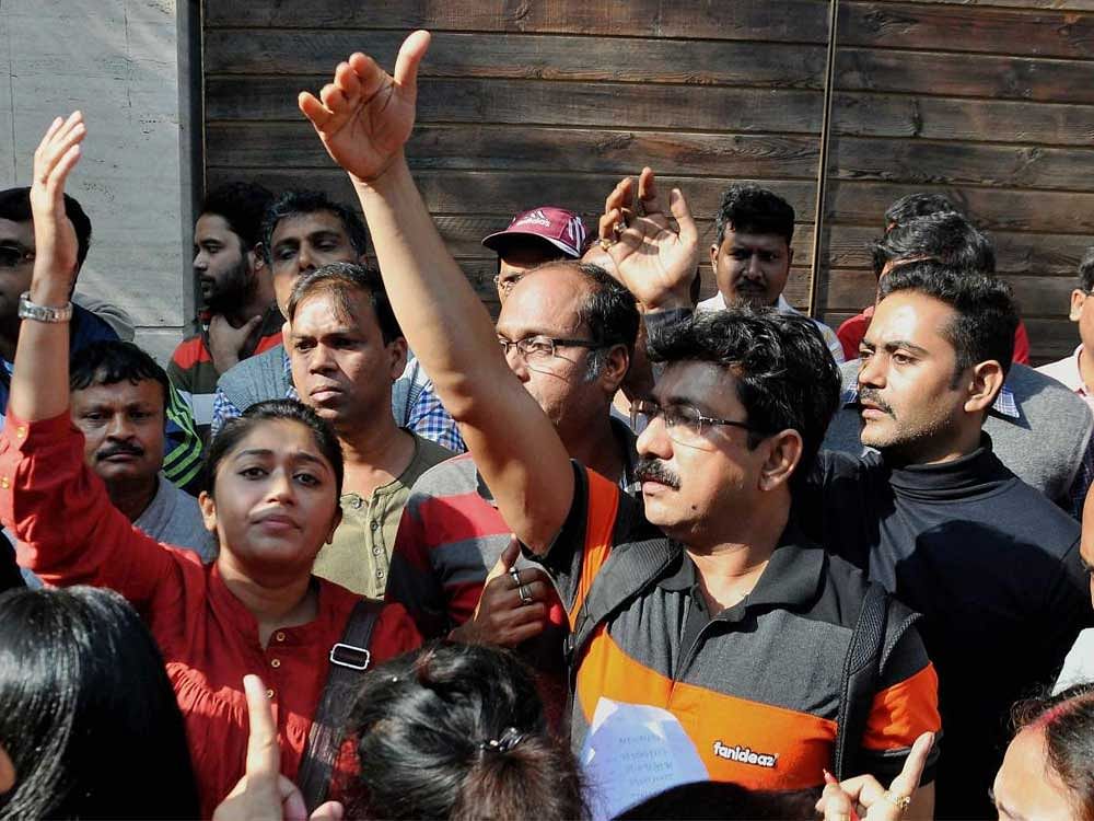 People protested against the sexual assault on a four-year-old student of the G D Birla Centre for Education. PTI Photo