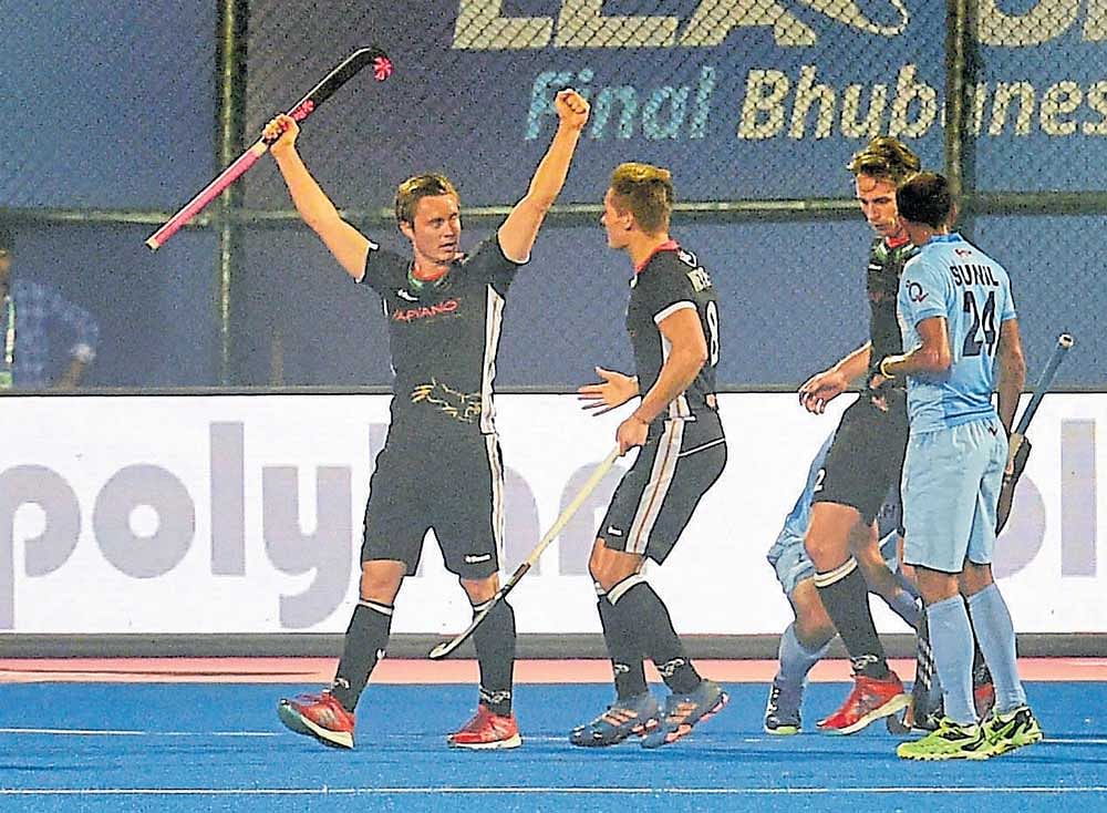 Jubilant: German players celebrate after scoring against India during their Hockey World League Final tie on Monday. PTI