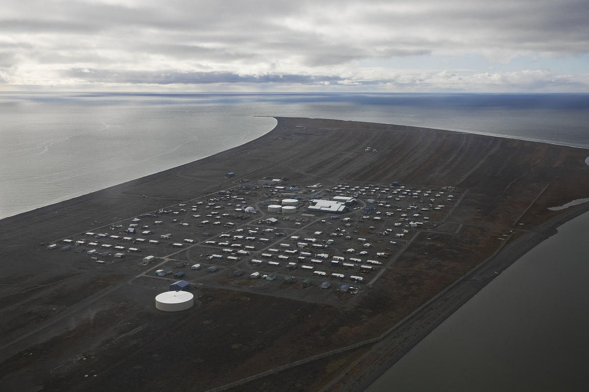 The remote whaling community of Point Hope, with less than 800 people, sits on a spit of land on the northwest coast of Alaska, Sept. 13, 2017. As a surprising and bittersweet result of global warming - and in a side effect of economic globalization - one of the nation's fastest internet connections in America has come to Point Hope. (Ruth Fremson/The New York Times)