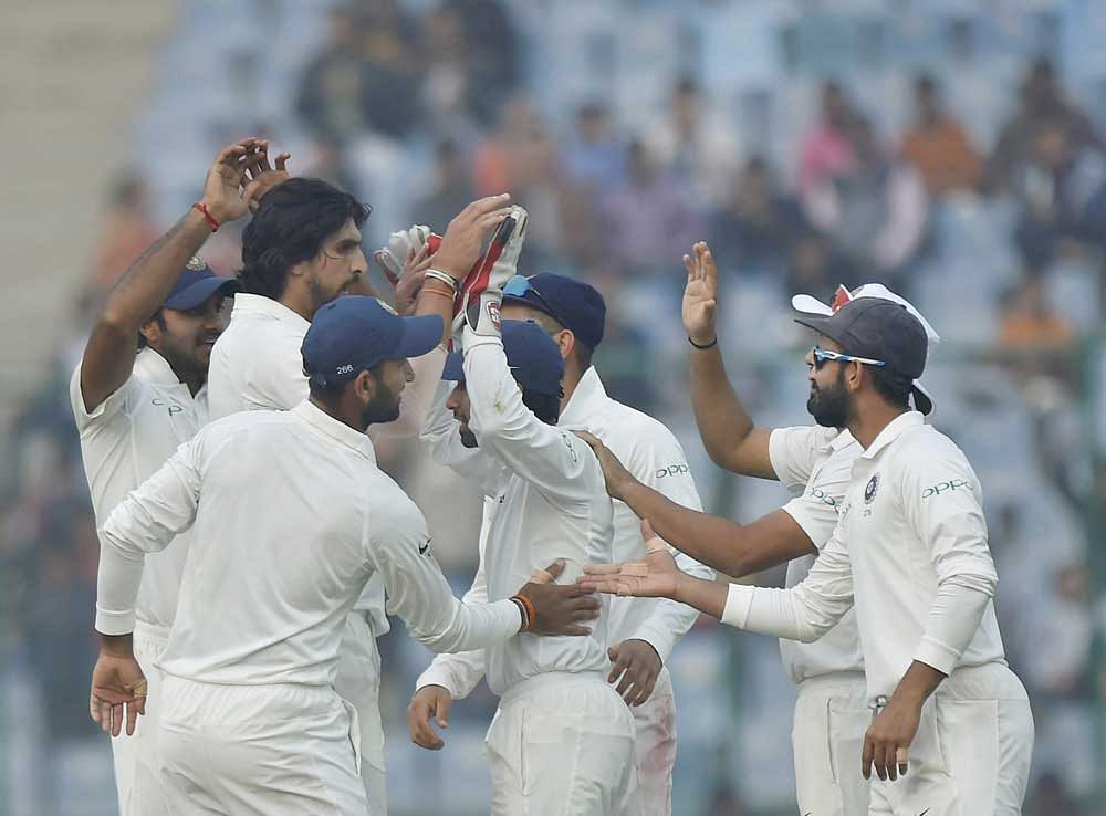 India's Ishant Sharma celebrates the wicket of Sri Lanka's Sadeera Samarawickrama during the third day of the third cricket test match, at Ferozshah Kotla in New Delhi on Monday. PTI Photo