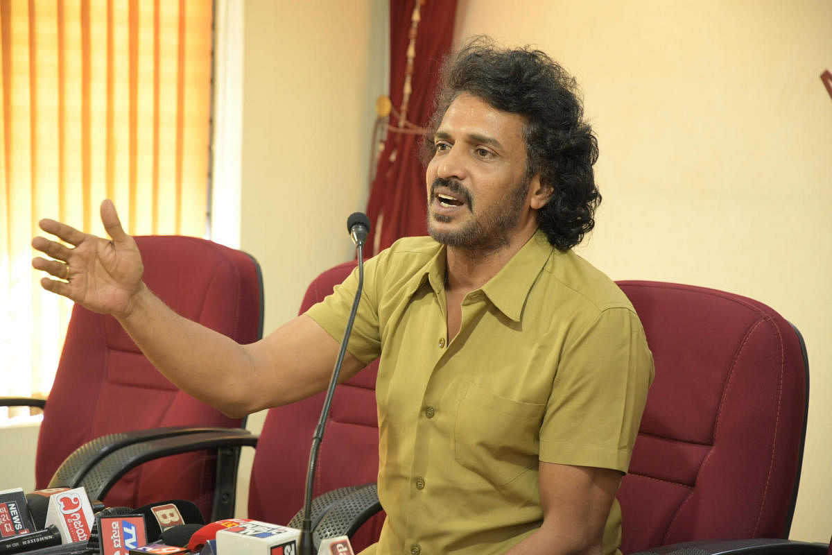 Actor-director Upendra addresses a press conference of the Karnataka Prajnavanta Janata Paksha at Patrika Bhavan in Mangaluru on Tuesday.