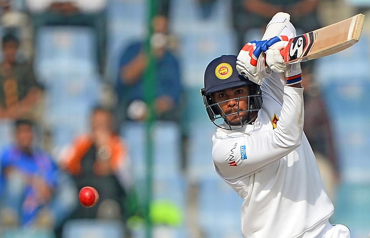 HANSOME... Dhananjaya de Silva drives en route to his century on the final day of the third Test. AFP