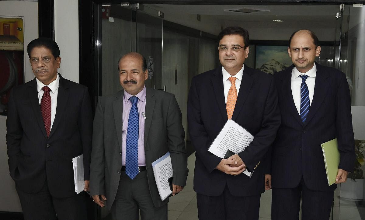 Mumbai: RBI Governor Urjit Patel along with deputy governors BP Kanungo (L), N S Vishwanathan (2nd L) and Viral Acharya (R), arrives for a press conference to announce the RBI's monetary policy at its headquarters in Mumbai on Wednesday. PTI Photo by Shirish Shete (PTI12_6_2017_000102A)