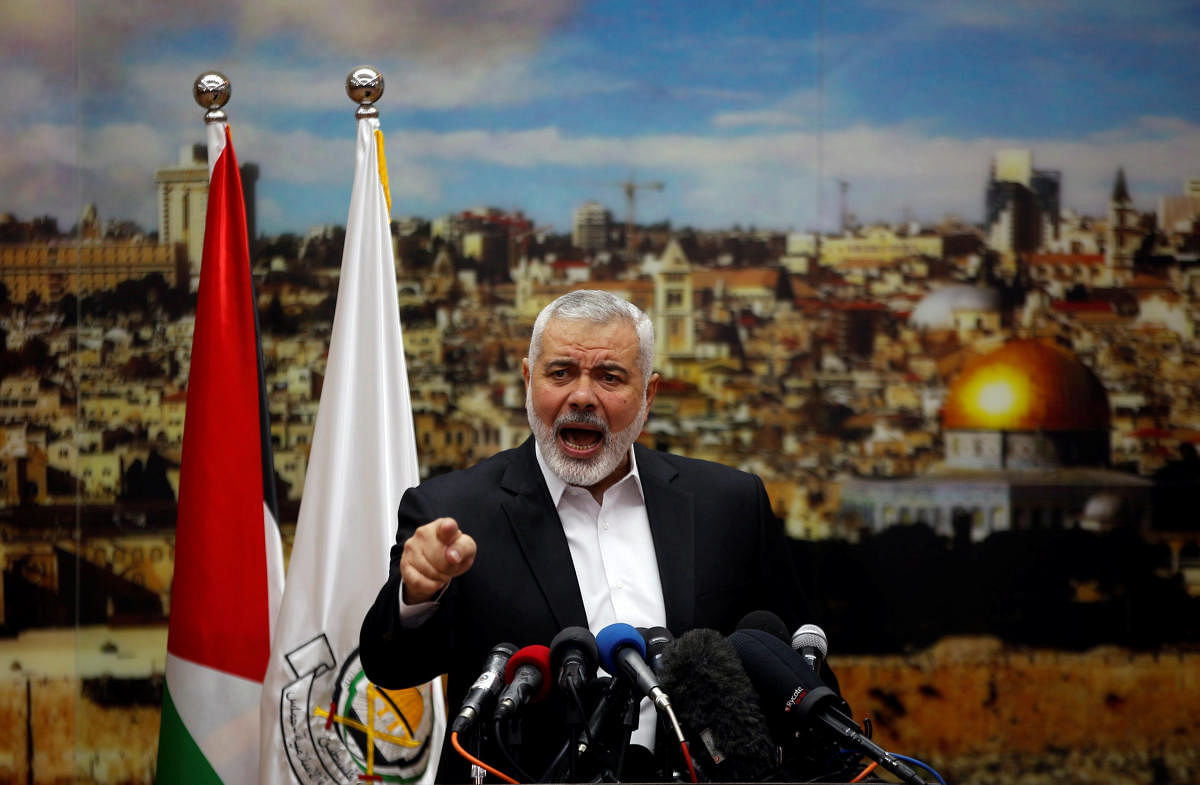 Hamas Chief Ismail Haniyeh gestures as he delivers a speech over US President Donald Trump's decision to recognize Jerusalem as the capital of Israel, in Gaza on Thursday. REUTERS