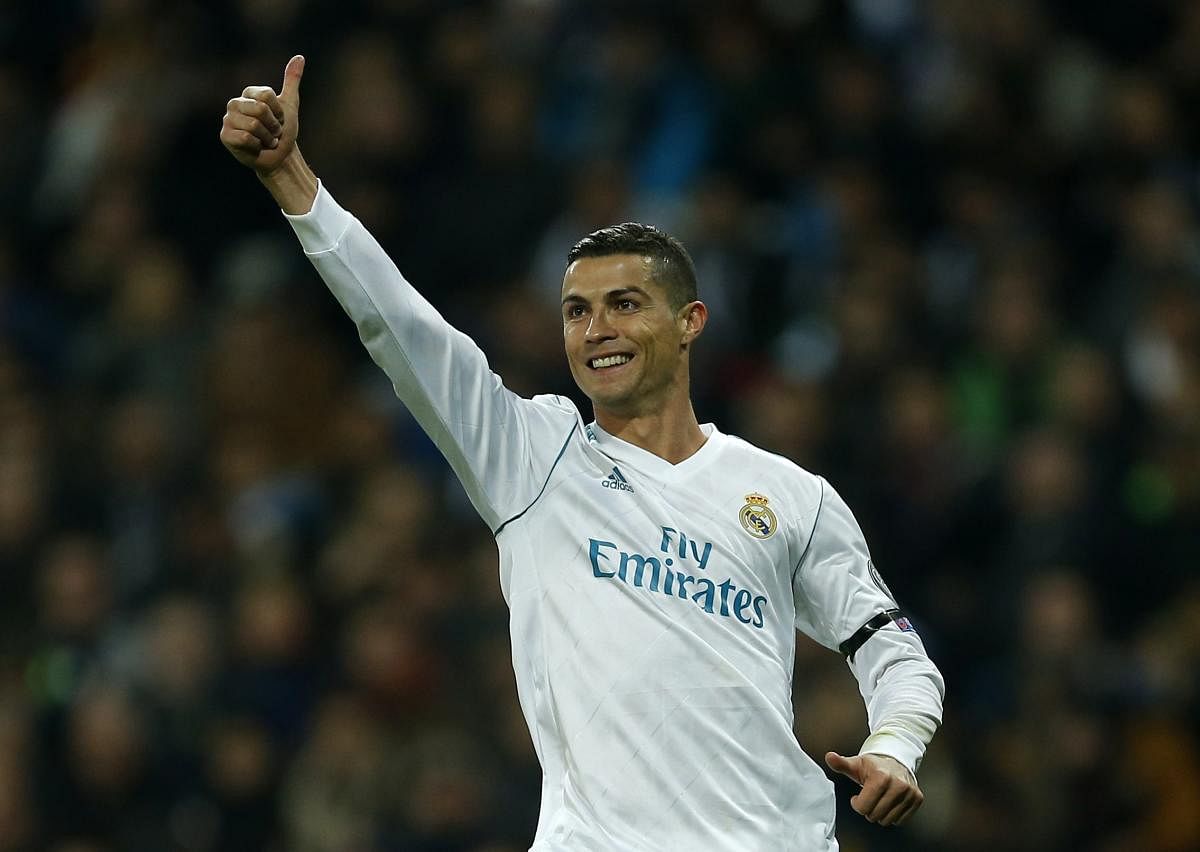 RECORD MAN: Real Madrid's Cristiano Ronaldo celebrates after scoring against Borussia Dortmund on Wednesday. PTI
