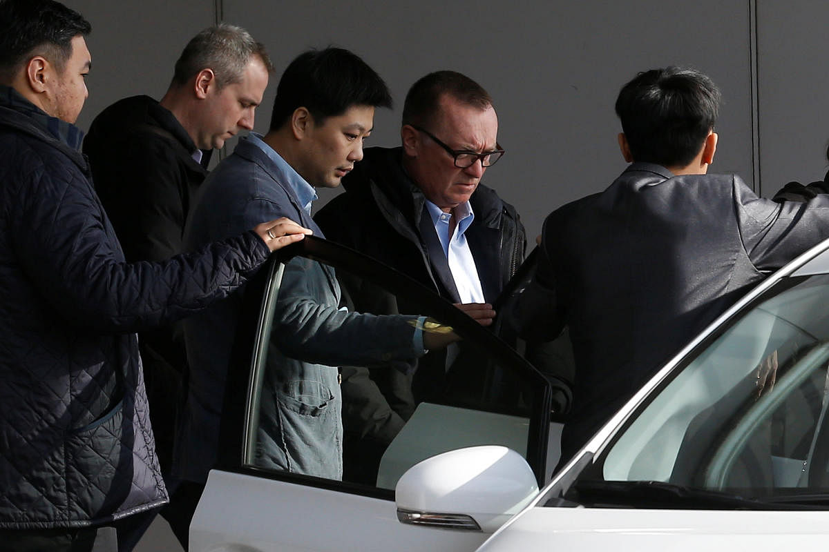 United Nations political affairs chief Jeffrey Feltman (2nd R) arrives at Beijing airport after his return from North Korea in Beijing, China, December 9, 2017.