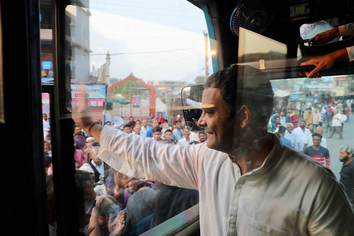 Congress vice-president Rahul Gandhi waves to his supporters at Kheda district in Gujarat on Friday during election campaign.