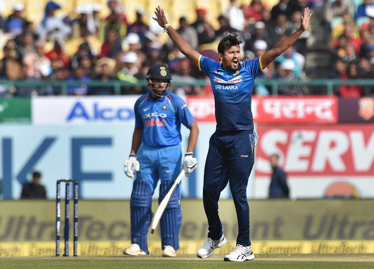 Suranga Lakmal appeals for a caught-behind verdict against Rohit Sharma in the first ODI at Dharamsala on Sunday. PTI