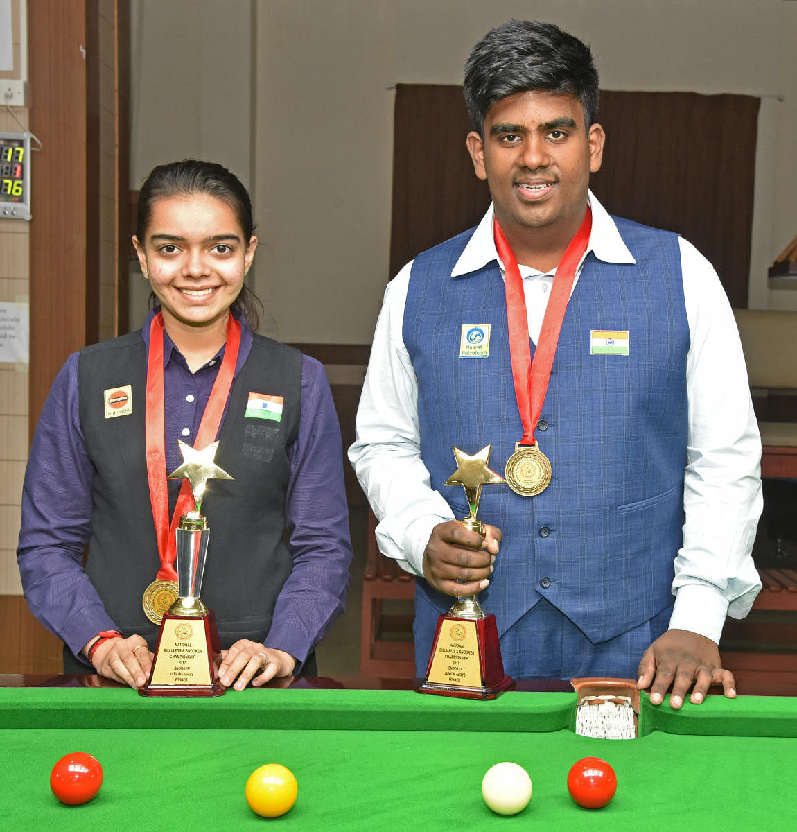 ALL SMILES Ishika Shah (left) of Madya Pradesh and S Shikrishna won the junior girls' and boys' snooker championship at Karnataka State Billiards Association on Sunday. DH Photo