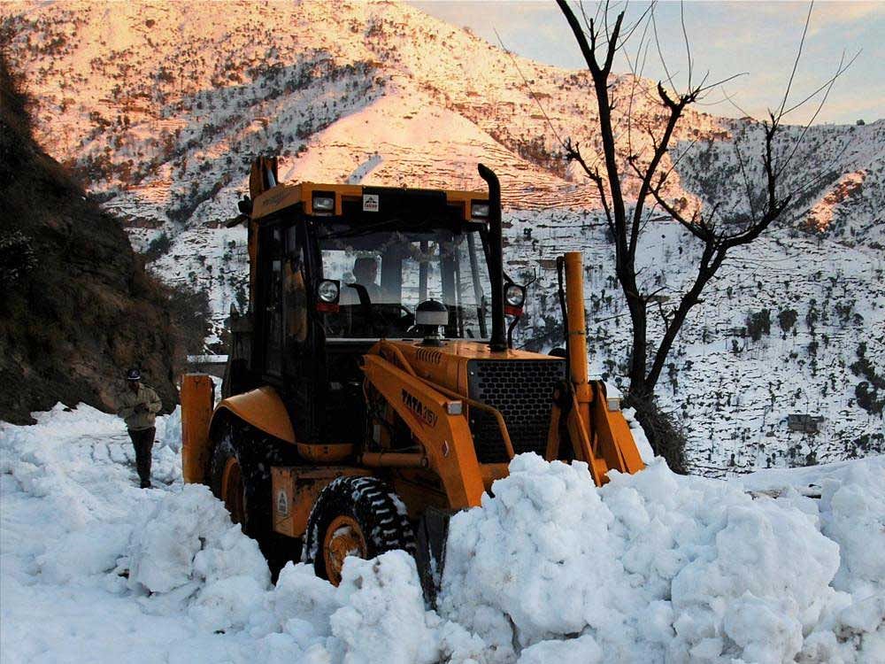 Blizzard-like weather conditions caused by heavy snowfall are hampering rescue operations. PTI file photo