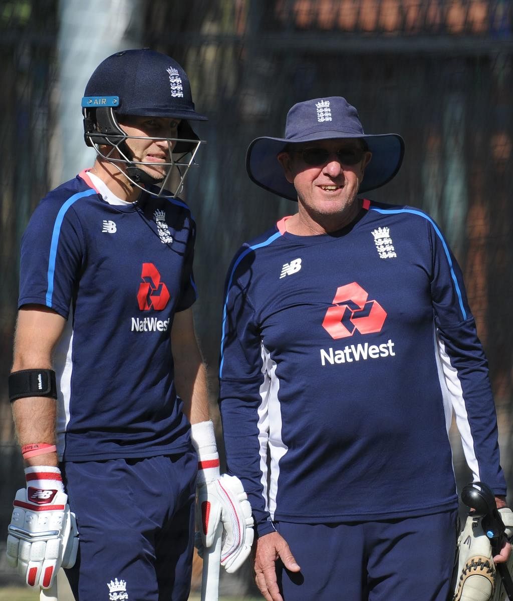 WHAT NEXT? England's captain Joe Root (left) chats with coach Trevor Bayliss on the eve of the third Ashes Test match in Perth. AFP