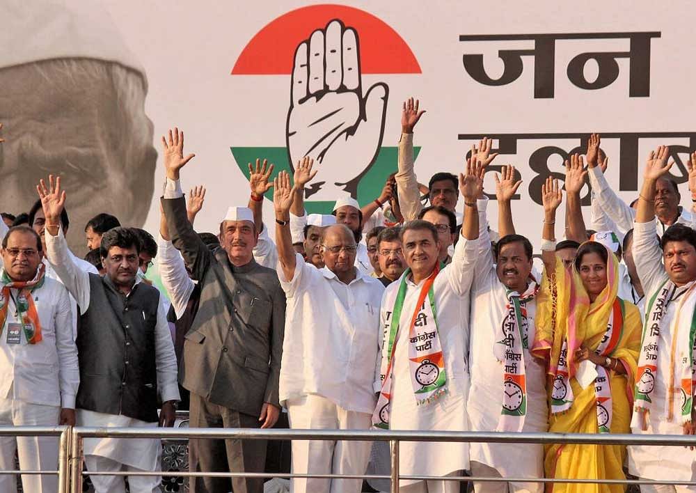 NCP President Sharad Pawar Praful Patel and Congress leader Gulam Nabi Azad and MPPCC president Ashok Chavan and others take part in "Jan Akrosh Hallabol Morcha" demanding loan waiver for farmers outside the Vidhan Bhawan during the winter session of Maharashtra Assembly, in Nagpur on Tuesday. PTI Photo