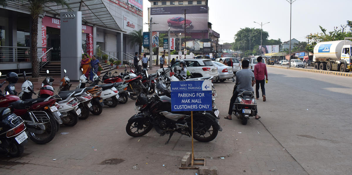 A view of the No Parking board in front of a mall in Kankanady.