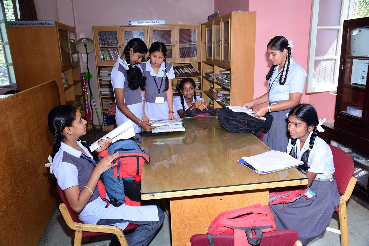 Students at the library established by Rotary Children's Library Association (RCLA) at Rotary School on JLB Road in Mysuru.