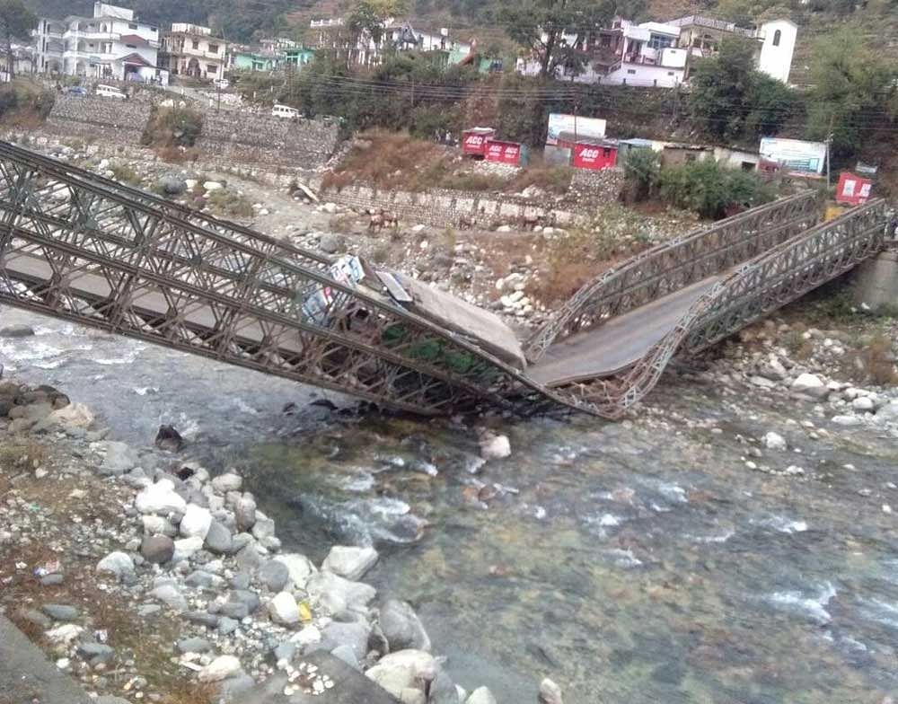The makeshift Gangotri bridge collapsed around 6 am when two trucks were crossing it, Uttarkashi District Magistrate Ashish Chauhan said. Image courtesy: @ANI Twitter