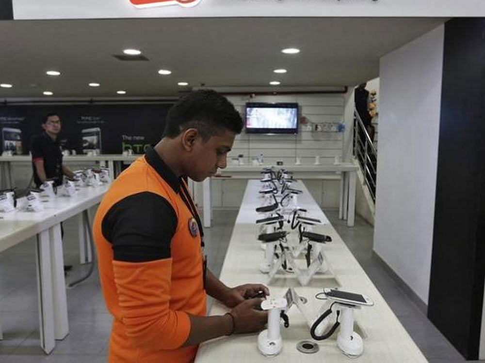 In a bid to promote Make in India, the government on Friday increased the import duty on a number of electronic items such as mobile phones, television sets, microwave ovens, LED lamps and water heaters. Representational image. Photo credit: Reuters