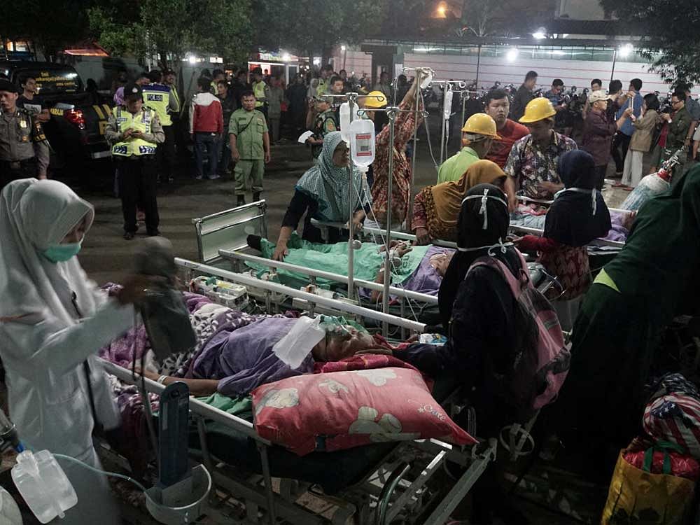 A hospital in Banyumas suffered damaged ceilings, cracked walls and leaks to oxygen pipelines, forcing about 70 patients to be moved to temporary shelters. Reuters Photo