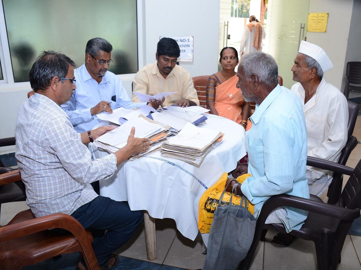 Railway pensioners register their grievances at the SWR Hubballi division's 31st Pension Adalat held in Hubballi on Friday.