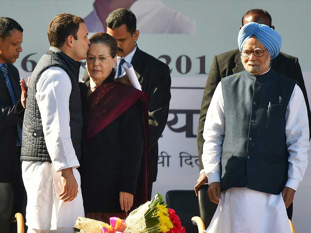 Rahul walked up to Sonia, who was seen drinking some water to ease her throat. PTI photo.