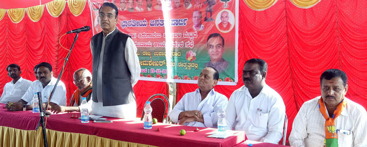 BJP state vice president B Somashekar addresses party workers at Doddegowdana Koppalu in Malavalli taluk,Mandya district.