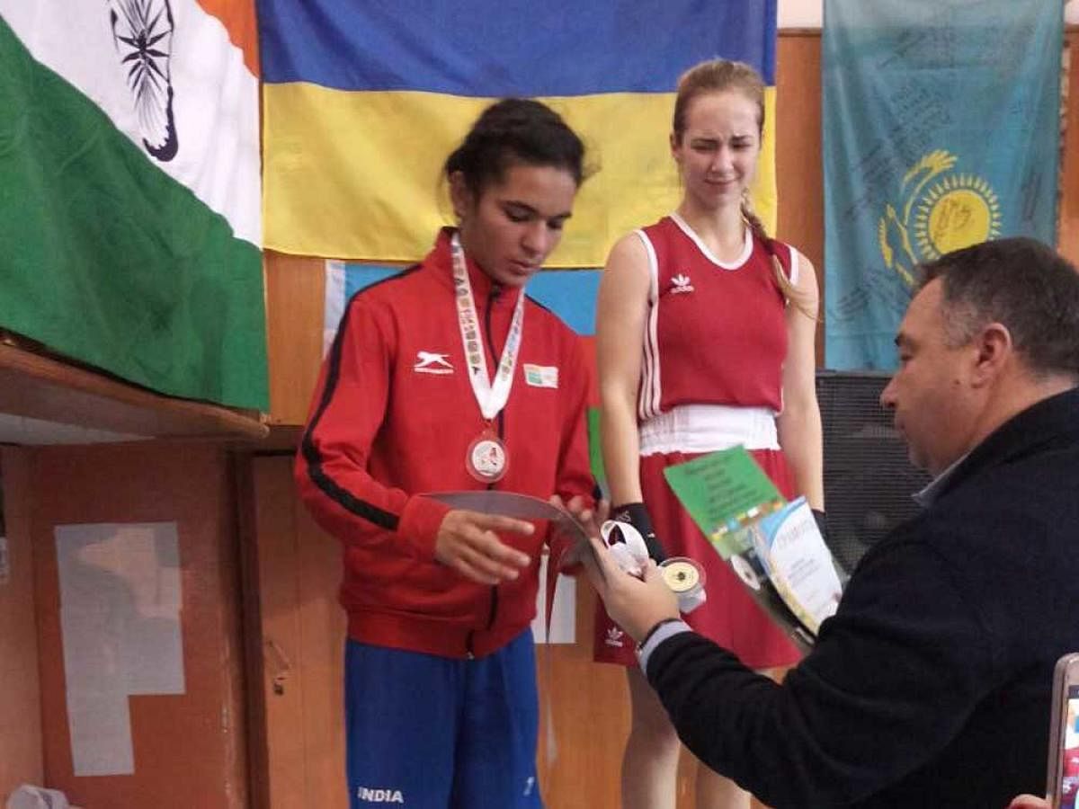 The 15-year-old, who competes in the 54kg category, was among the seven medallists, four of them gold, at the tournament which concluded in the Ukrainian city of Nadvirna today. Image courtesy: Twitter/@AnnuKumar783