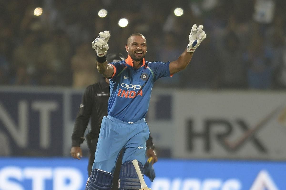 ON SONG India's Shikhar Dhawan celebrates after completing his century in the third ODI against Sri Lanka in Visakhapatnam on Sunday. AFP