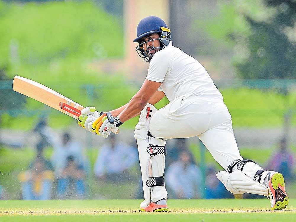 Karun Nair's 153 helped Karnataka take a first innings lead of 116 runs against Vidarbha in the Ranji Trophy semifinal.
