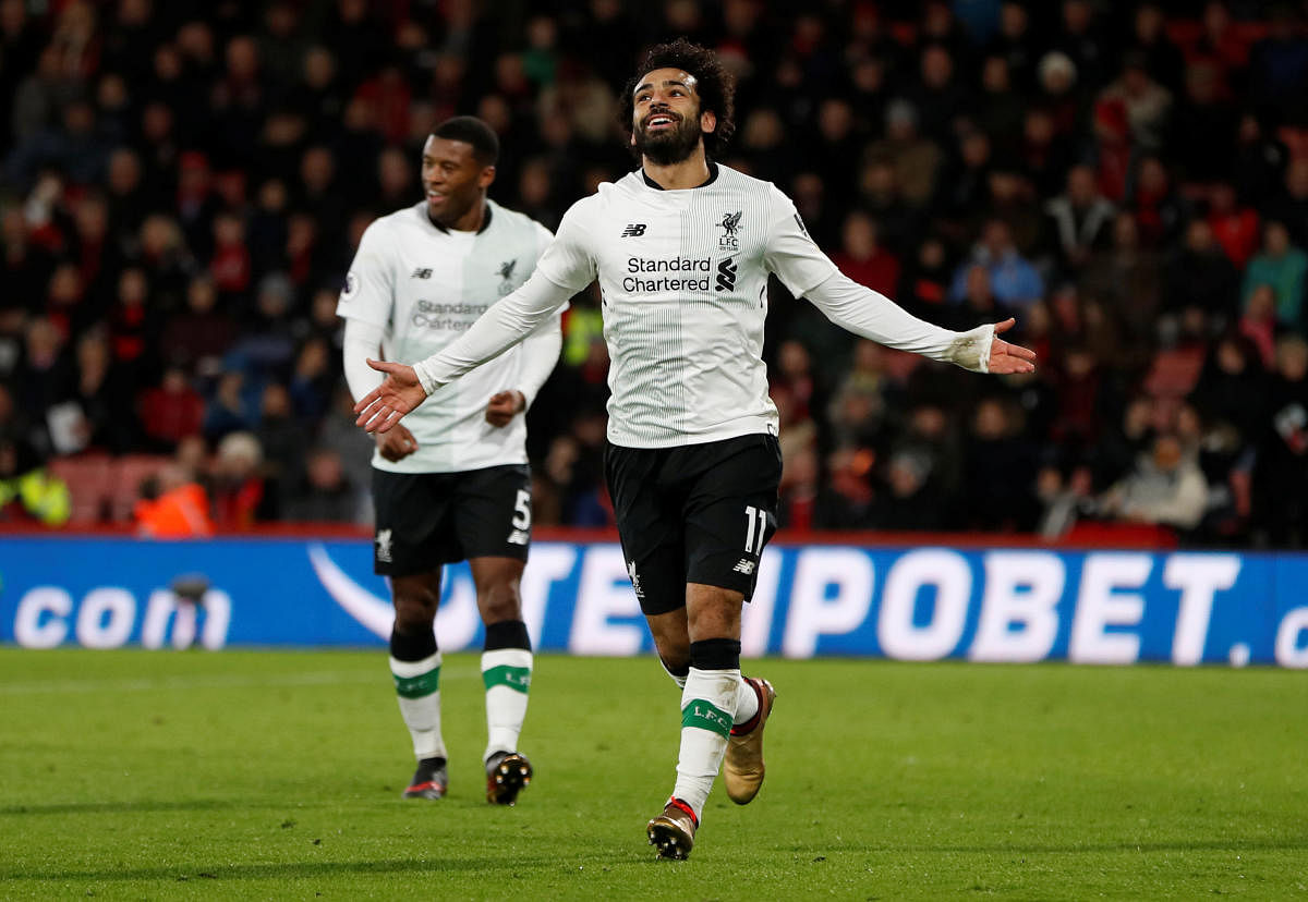 Soccer Football - Premier League - AFC Bournemouth vs Liverpool - Vitality Stadium, Bournemouth, Britain - December 17, 2017 Liverpool's Mohamed Salah celebrates scoring their third goal Action Images via Reuters/Paul Childs EDITORIAL USE ONLY. No use with unauthorized audio, video, data, fixture lists, club/league logos or