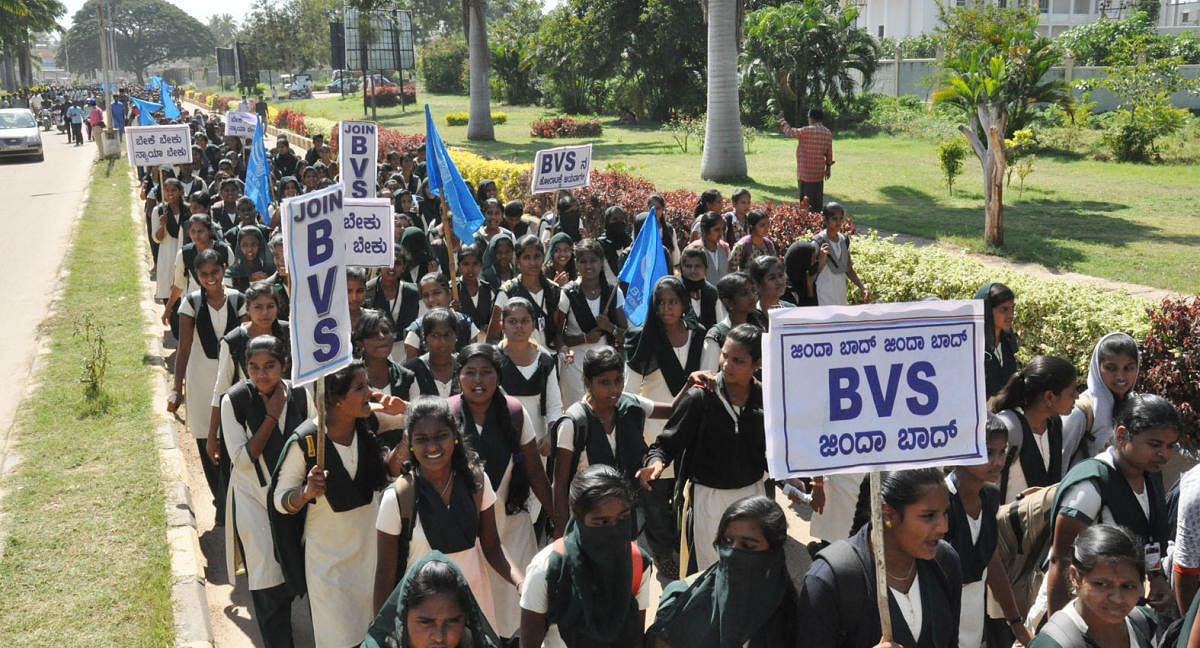 Members of Bahujan Vidyarthi Sangha (BVS) take out a protest rally against the gang-rape and murder of school girl, in Chamarajanagar, on Thursday.