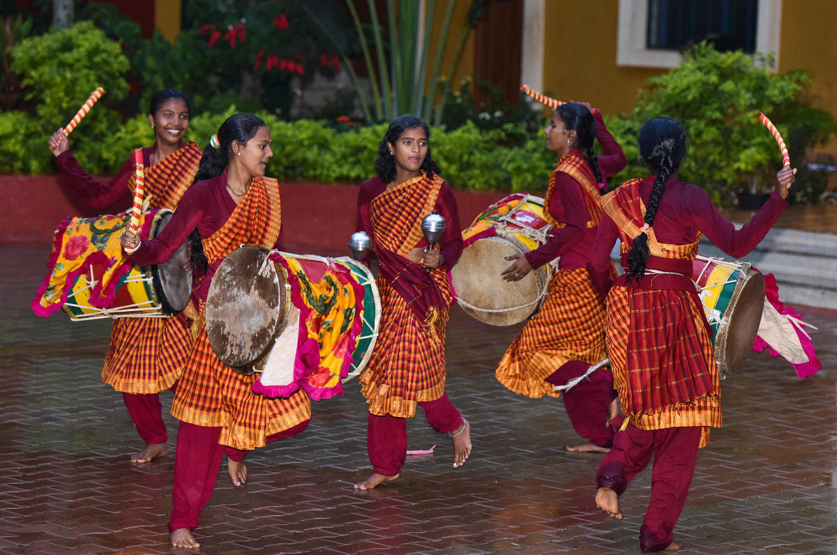 A team of underprivileged girls performing Dollu Kunitha. DH photo by Manjunath M S