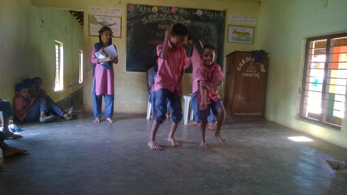 Children do a jig on 'No Bag Day' at the Dakshina Kannada Zilla Panchayat Higher Primary School at Rajagudde.