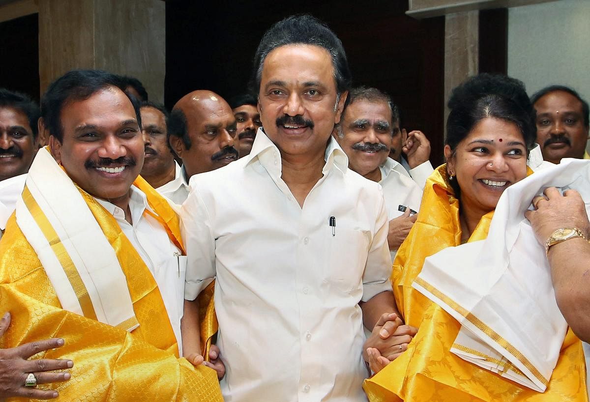 Special CBI judge O P Saini, who acquitted former telecom minister A Raja, DMK MP Kanimozhi and others in the case, said the CBI cannot absolve itself of the burden to prove its case by 'piggy riding on the so called high magnitude' of the case and the media hype. Above: A Raja, MK Stalin and Kanimozhi. PTI file photo