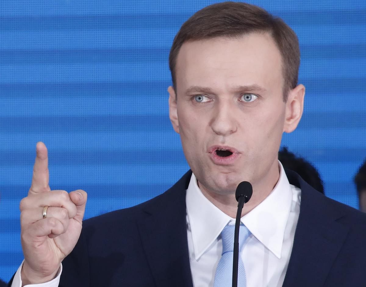 Russian Opposition leader Alexei Navalny delivers a speech during a meeting to uphold his bid for presidential candidate, in Moscow, Russia, on Sunday. REUTERS