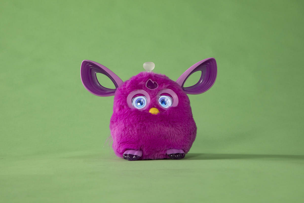 A plush Furby Connect, an interactive toy that, among other things, can smile back at a child and laugh when tickled. Many manufacturers are promoting
