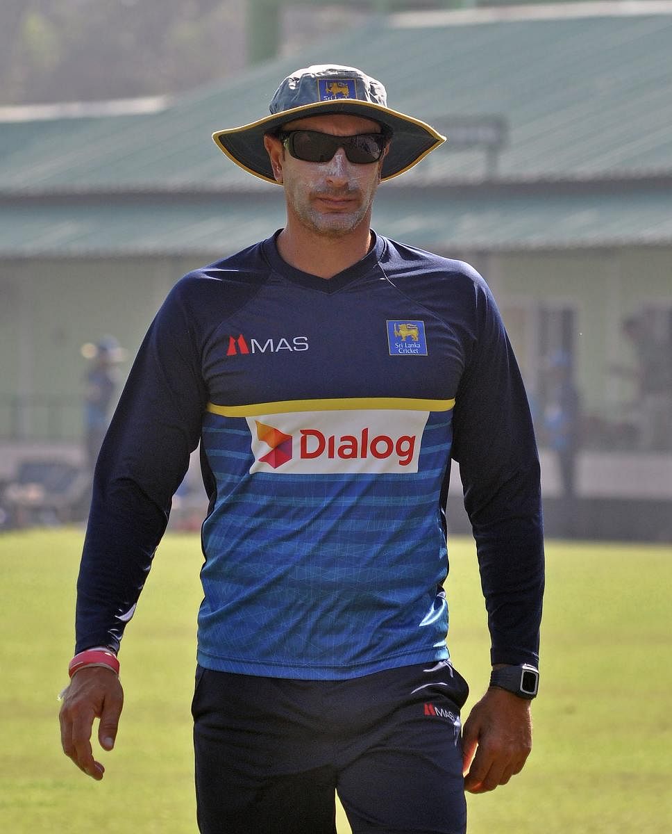 Sri Lanka's cricket coach Nic Pothas takes part in a practice session in Kolkata on November 9, 2017 ahead of the first Test cricket match between India and Sri Lanka. AFP PHOTO