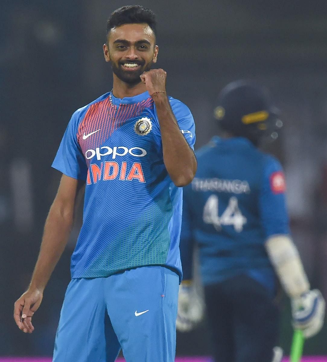 Indian cricketer Jaydev Unadkat celebrates after taking the wicket off Sri Lankan cricketer Niroshan Dickwella during the second T20 international cricket match between India and Sri Lanka at the Holkar Stadium in Indore on December 22, 2017. / AFP PHOTO / INDRANIL MUKHERJEE / ----IMAGE RESTRICTED TO EDITORIAL USE - STRICTLY NO COMMERCIAL USE----- / GETTYOUT