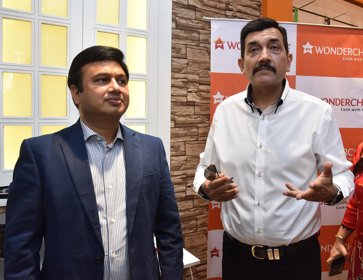 Ravi Sexena, Managing Director, Wonderchef and Sanjeev Kapoor, Chef, at Wonderchef cookware and kitchen appliances outlet launching at Commercial Street in Bengaluru on Monday. Photo by S K Dinesh