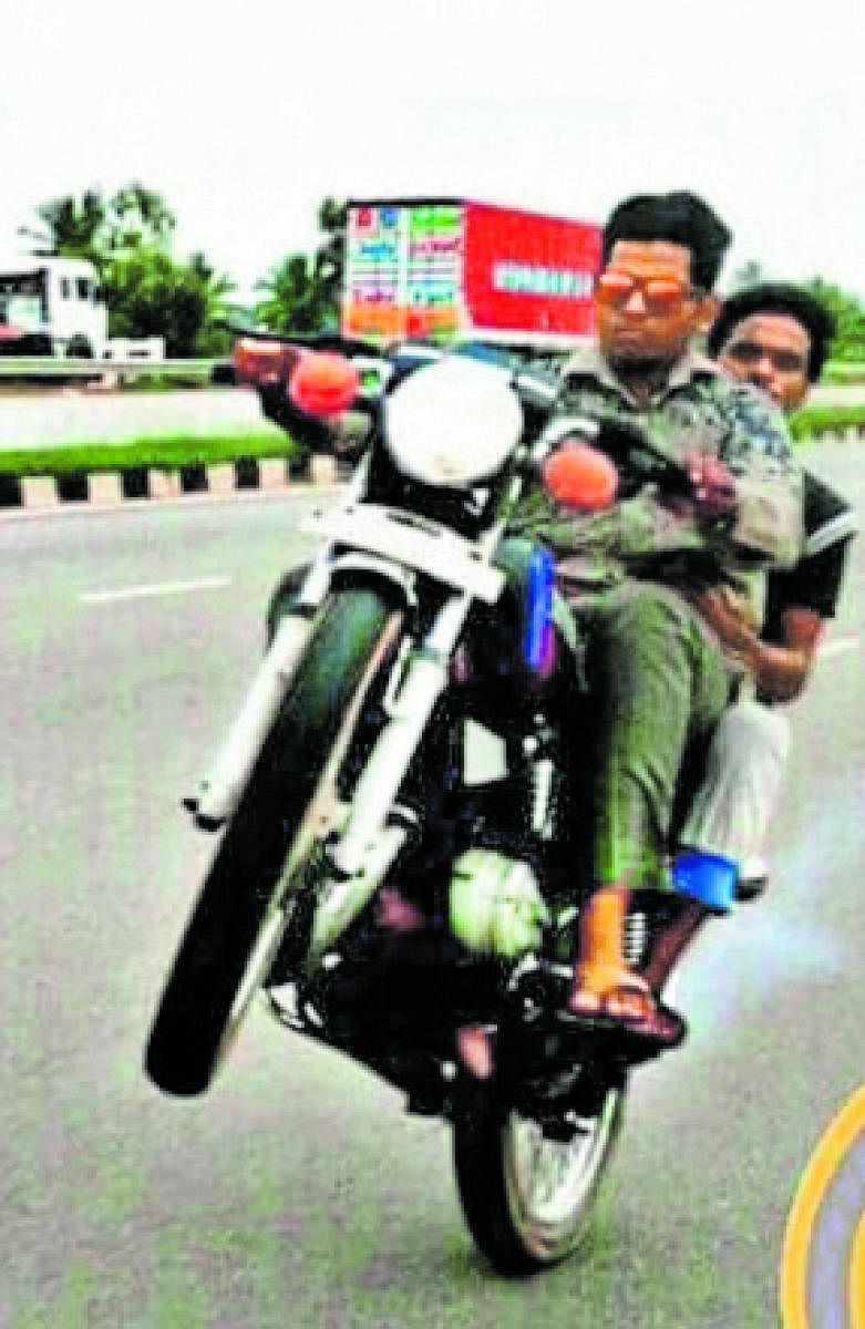 Mudasir Pasha performs danderous stunts on his bike.