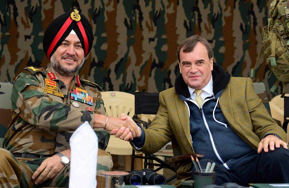 Lieutenant General Ranbir Singh and British High Commission Dominic Asquith during the joint military exercise 'Ajeya Warrior- 2017' of India and the UK at Mahajan Field Firing range in Bikaner, Rajasthan on Thursday. PTI Photo