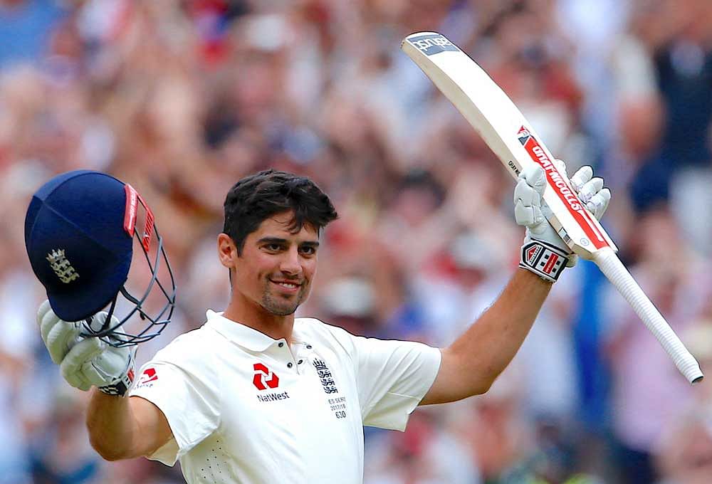 England's Alastair Cook celebrates after reaching his double-century during the third day of the fourth Ashes cricket test match