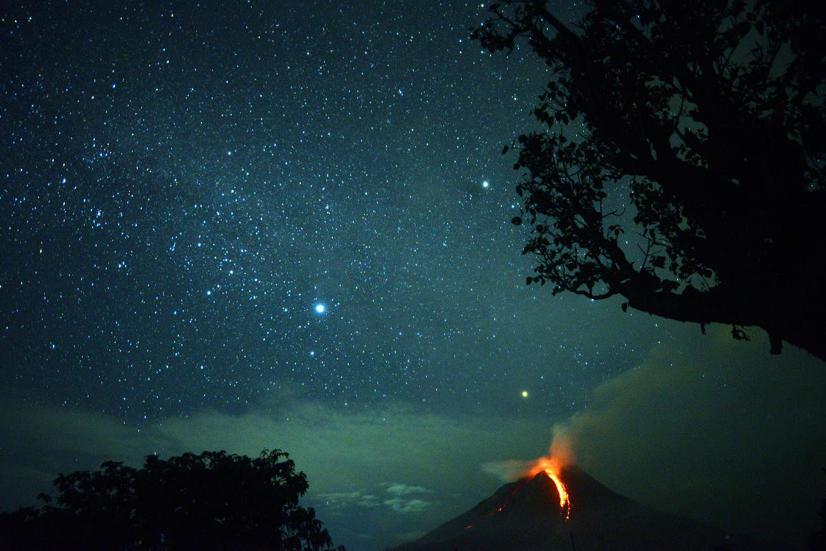 Moung Sinabung volcano spews lava that lights up the night sky in Karo, North Sumatra. AFP