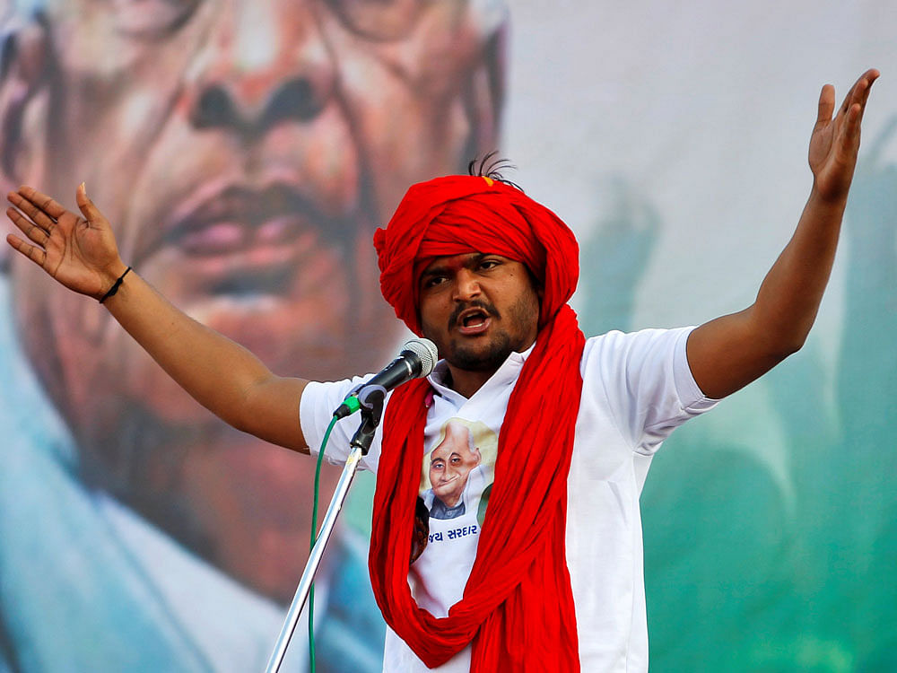 Hardik Patel said that he would talk to the Congress to give a worthy post to Nitin Patel if he quit the BJP. Reuters file photo.