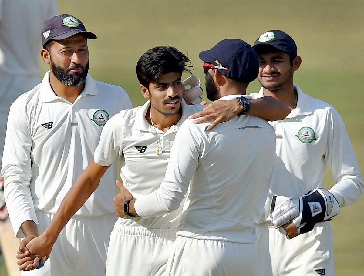 LETHAL Vidarbha's Rajneesh Gurbani celebrates after dismissing a Delhi batsman on the second day of the Ranji Trophy final in Indore on Saturday. PTI