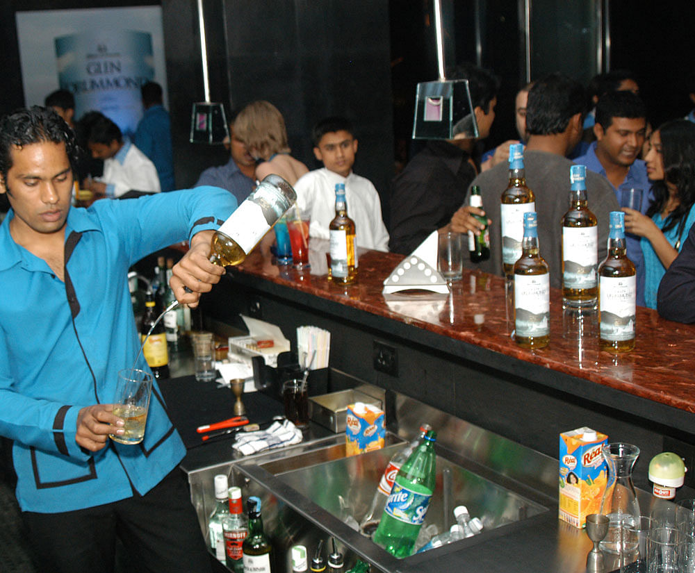 A dozen rooftop pubs and bars in upscale Indiranagar and Koramangala received fire safety notices on Saturday. DH file photo for representation