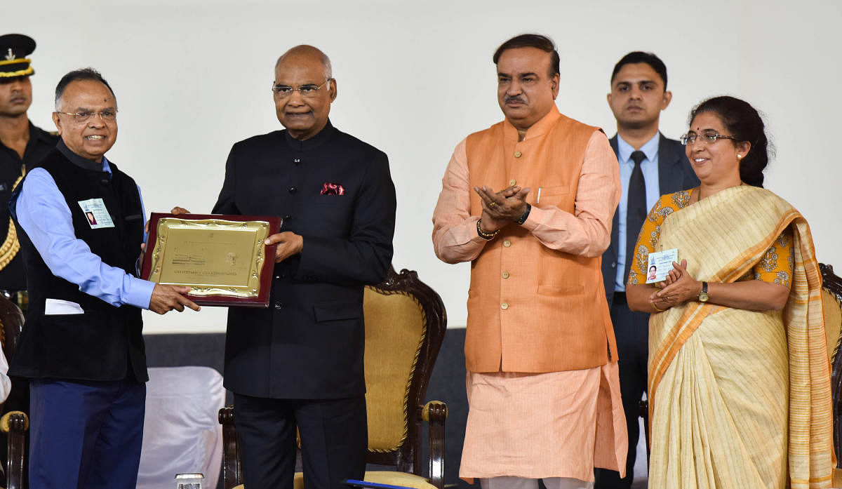 A H Rama Rao, president, NES, felicitates President Ram Nath Kovind at the school's 100th year celebrations on Saturday. Union minister Ananth Kumar and his wife Tejaswini Ananth Kumar are seen. DH PHOTOs