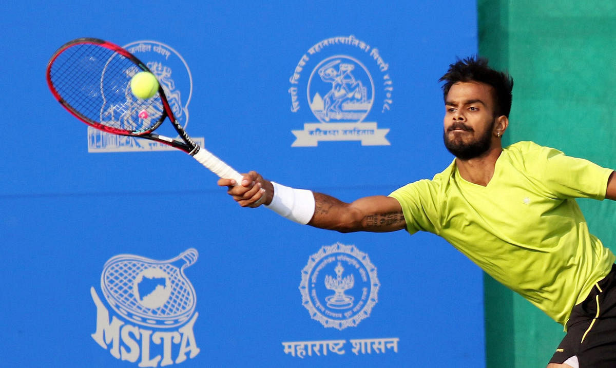 FULLY STRETCHED India's Sumit Nagal in action against Divij Sharan in the first round of qualifiers during the Tata Open tournament in Pune on Saturday. PTI
